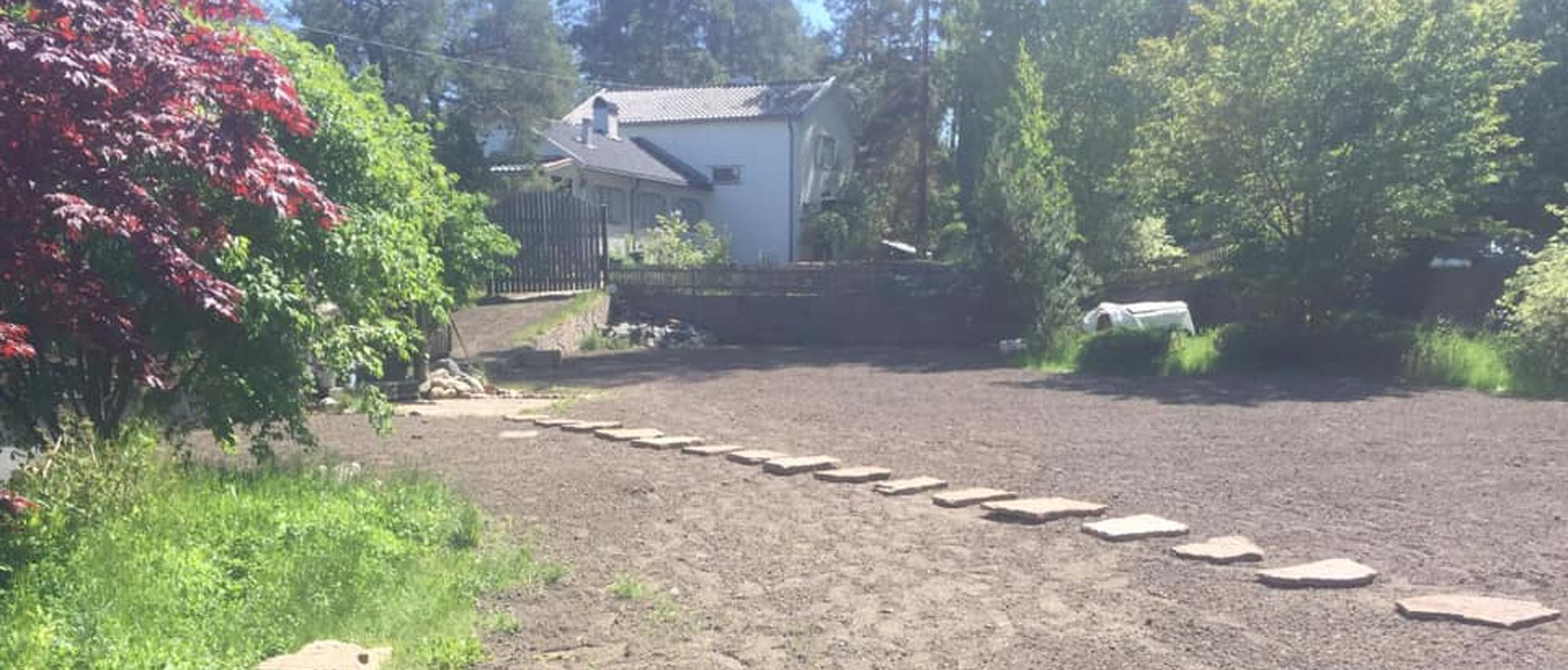 Markarbete utförs på en villatomt